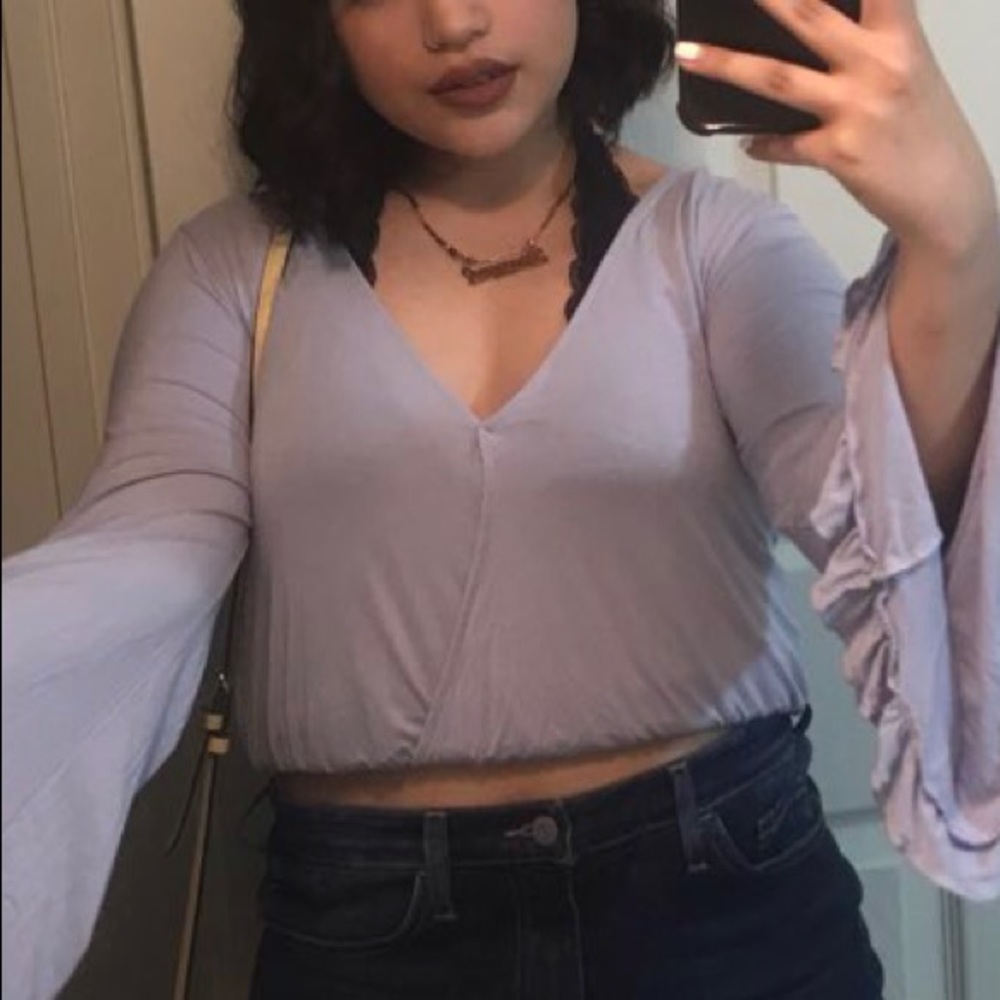 Pastel purple top , fits like (m)